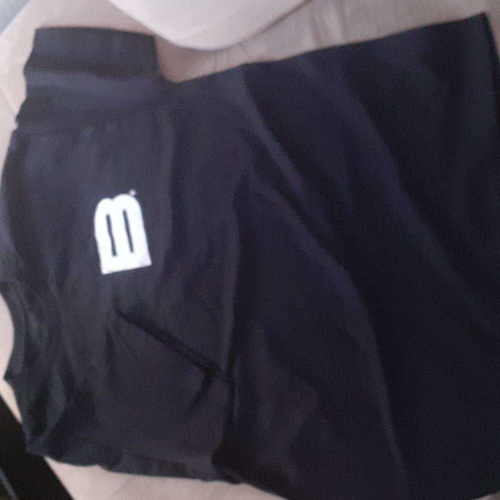 Never worn before mens XL tshirt